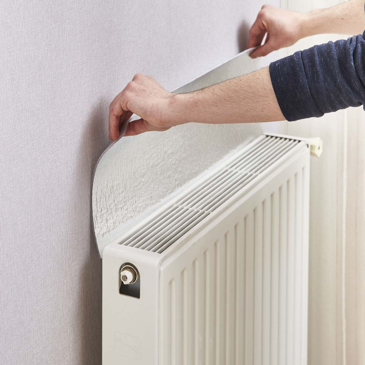 Pertes thermiques et isolant au dos du radiateur